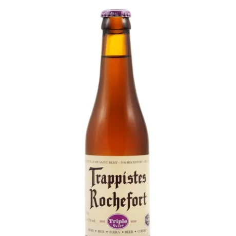 Botella de Cerveza Trappistes Rochefort Extra Triple rubia trapense belga dorada sobre fondo blanco